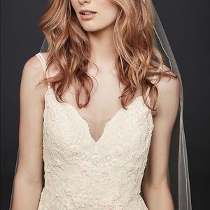 Brand New with tags. Size 16 - fits like a street size 12-14. Not altered.